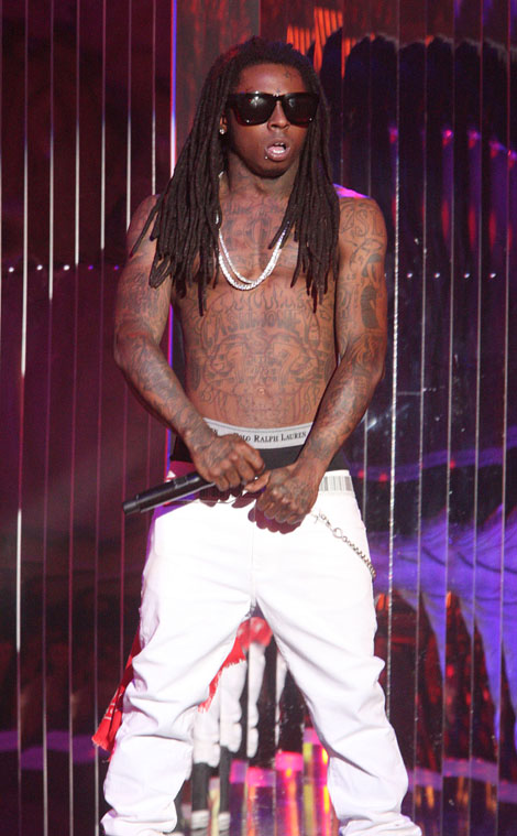 lil wayne jeans. saggin their skinny jeans.